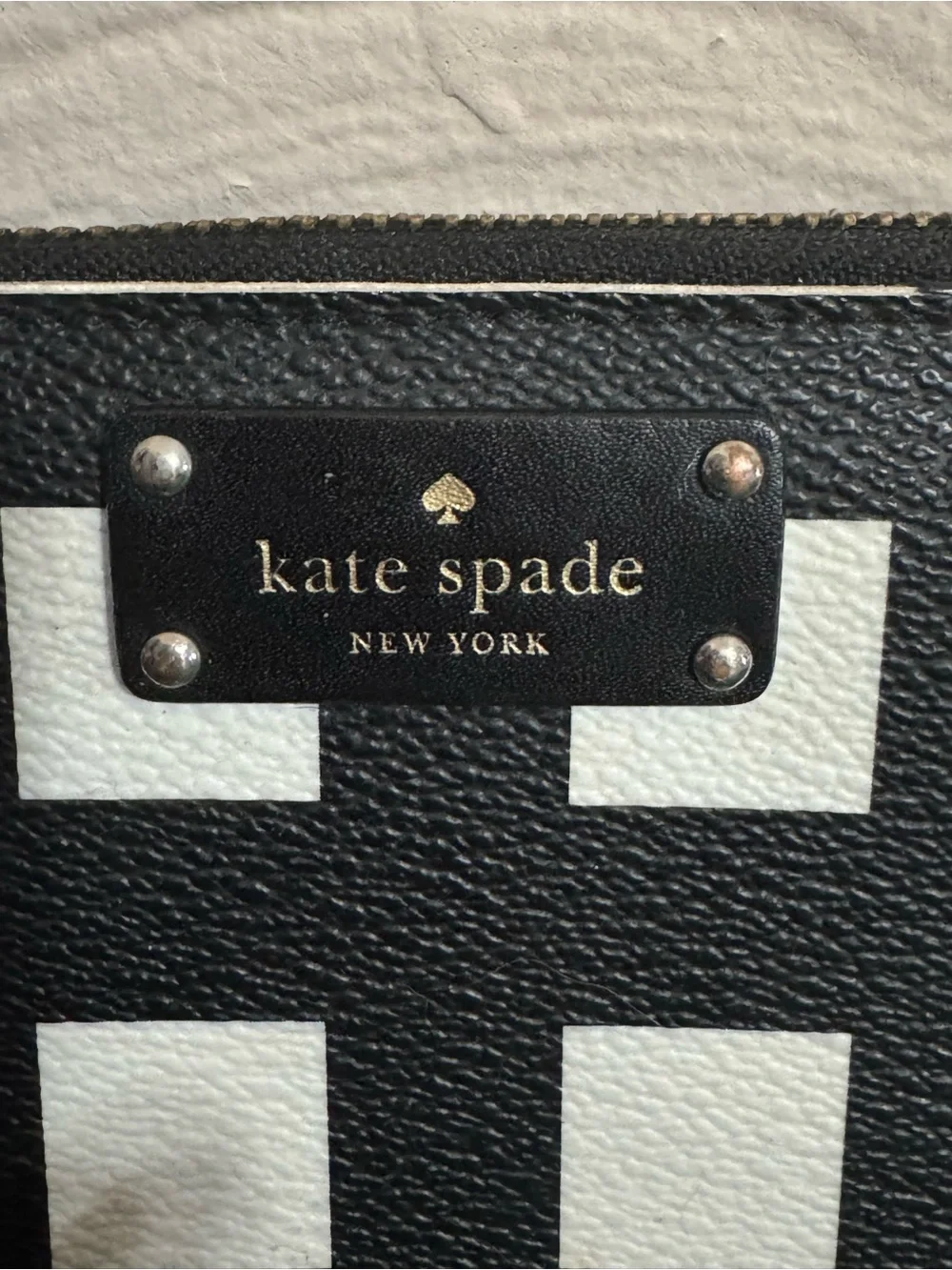 kate spade Black and White Check Zip-Around Wristlet with Pearl Strap